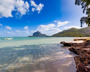 fishermen boats resting in the lagoon of le morne peninsula on mauritius island, indian ocena, africa.